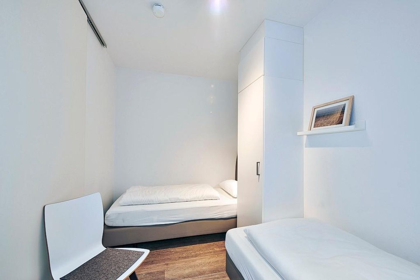 Deichhäuser Anna Küste Deichhäuser Anna Küste 4-11 Bensersiel - Schlafzimmer mit zwei Einzelbetten