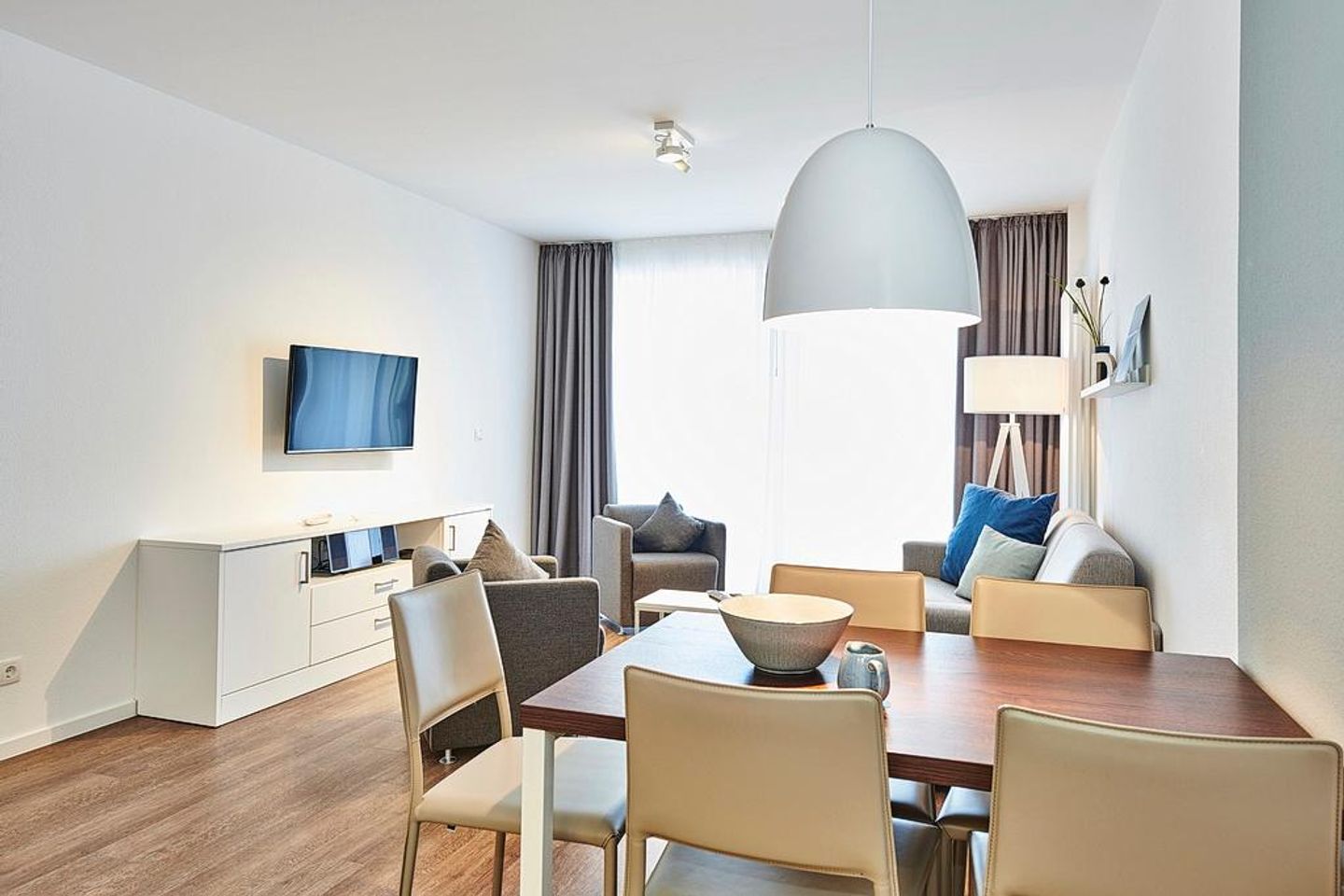 Deichhäuser Anna Küste Deichhäuser Anna Küste 4-20 Bensersiel - Essberiech mit Esstisch und Sitzgelegenheit