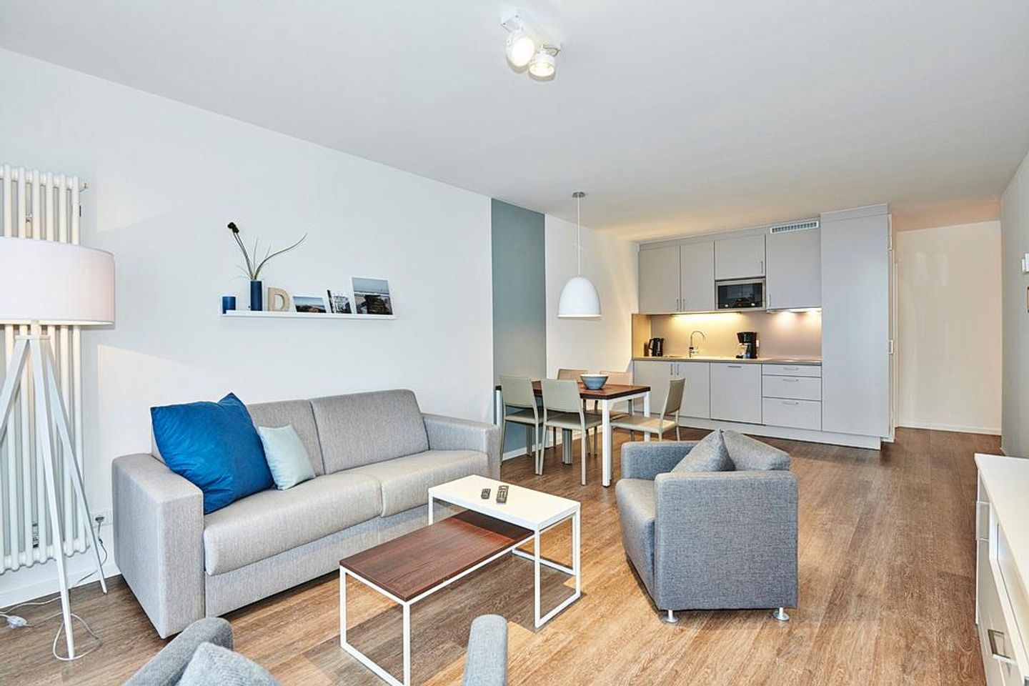 Deichhäuser Anna Küste Deichhäuser Anna Küste 4-20 Bensersiel - Wohnbereich mit Couch und Sessel