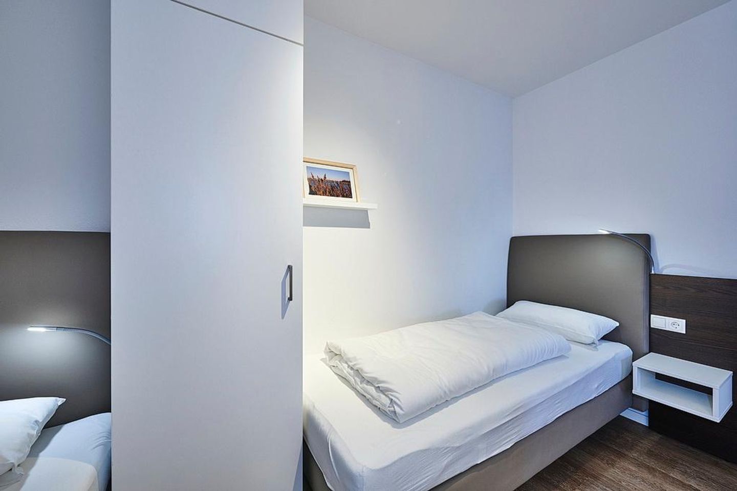 Deichhäuser Anna Küste Deichhäuser Anna Küste 4-21 Bensersiel - Schlafzimmer mit zwei Einzelbetten