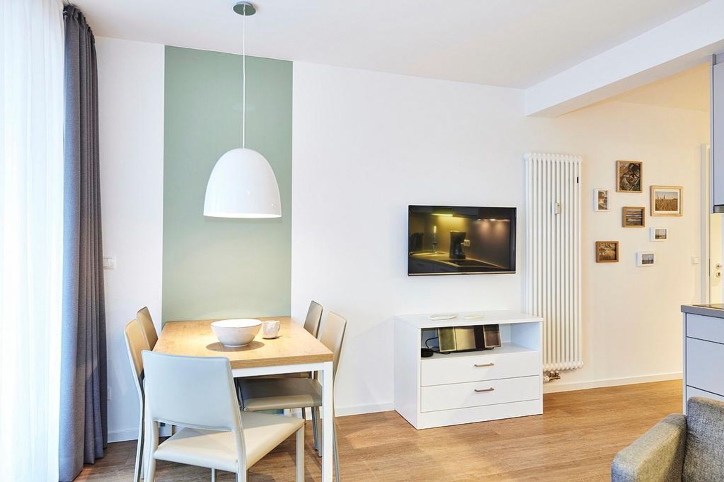 Deichhäuser Anna Küste Deichhäuser Anna Küste 4-23 Bensersiel - Essbereich mit Esstisch und Sitzgelegenheit