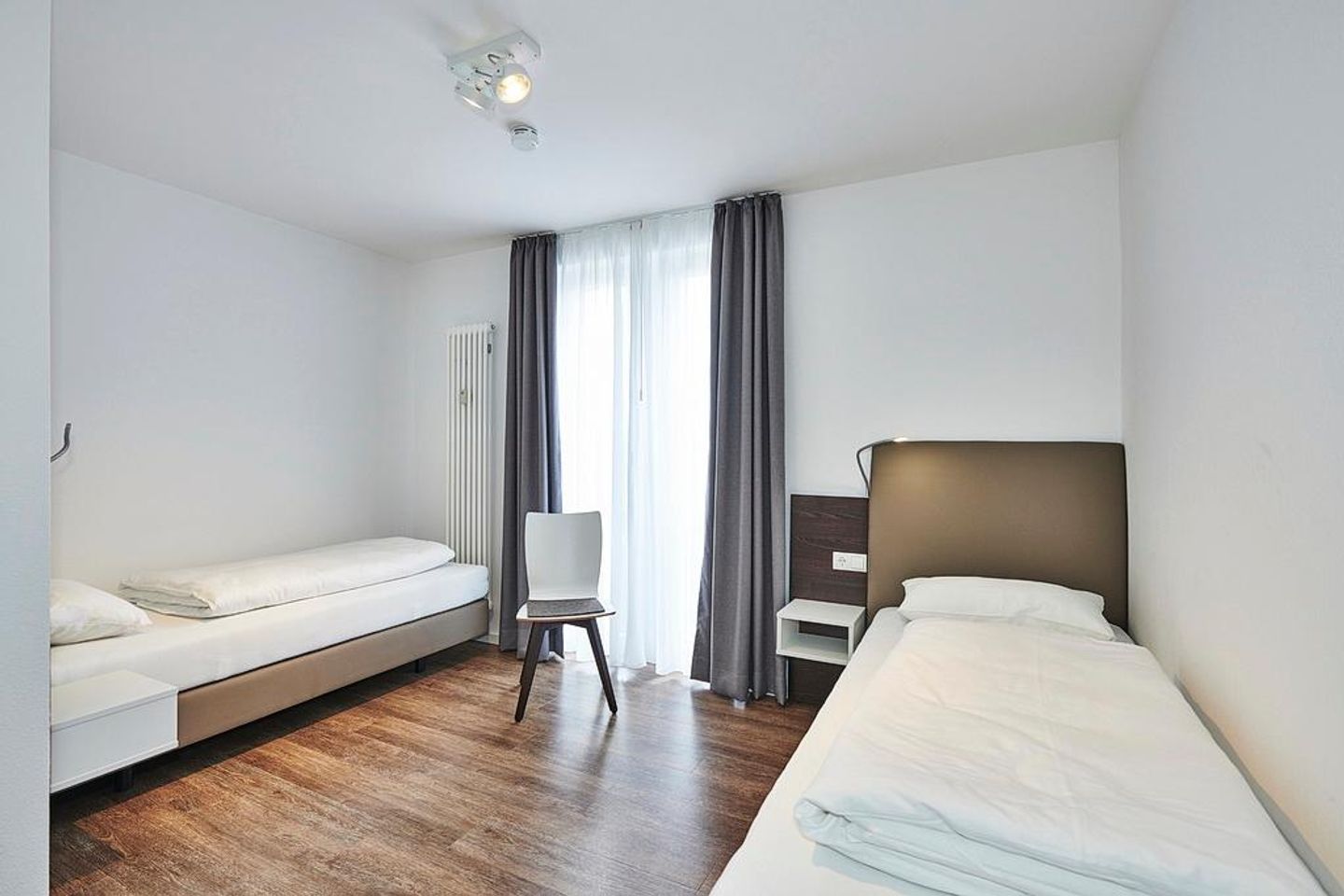 Deichhäuser Anna Küste Deichhäuser Anna Küste 4-34 Bensersiel - Schlafzimmer mit zwei Einzelbetten