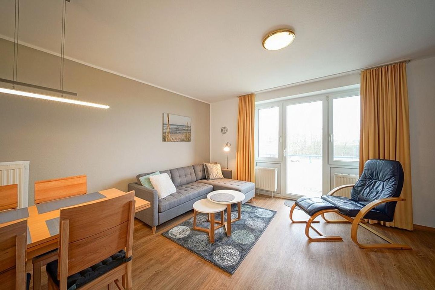 Hus Inselkieker Hus Inselkieker 220 Schillig - Wohnbereich mit Couch, Sessel, Couchtisch
