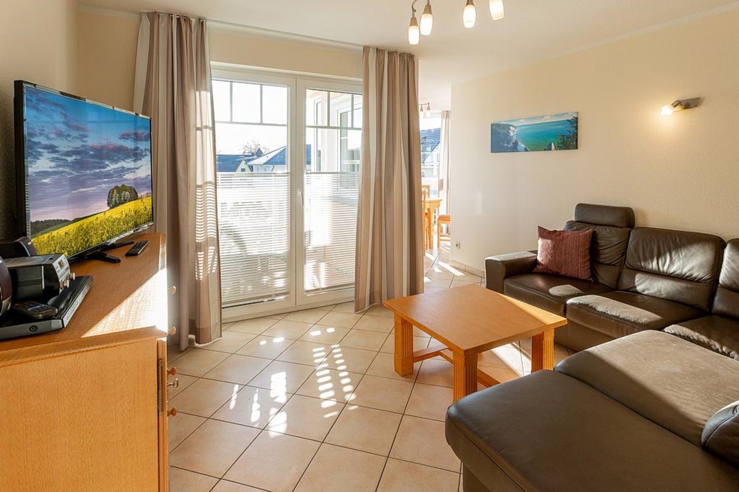 Villa Seerose Villa Seerose 08 Rügen - Wohn-Essbereich mit Couch