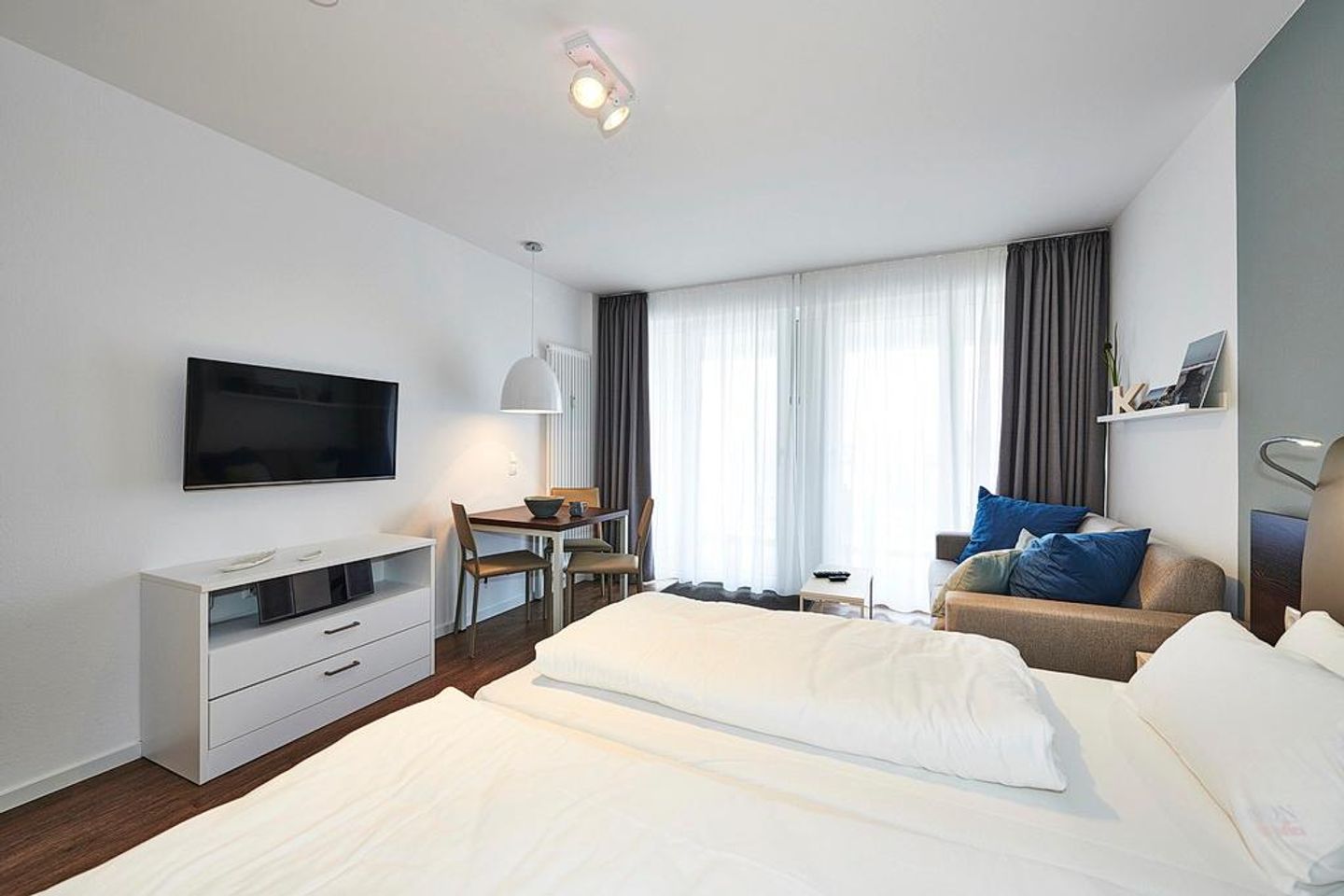 Deichhäuser Anna Küste Deichhäuser Anna Küste 3-22 Bensersiel - Wohn-, Ess- und Schlafbereich