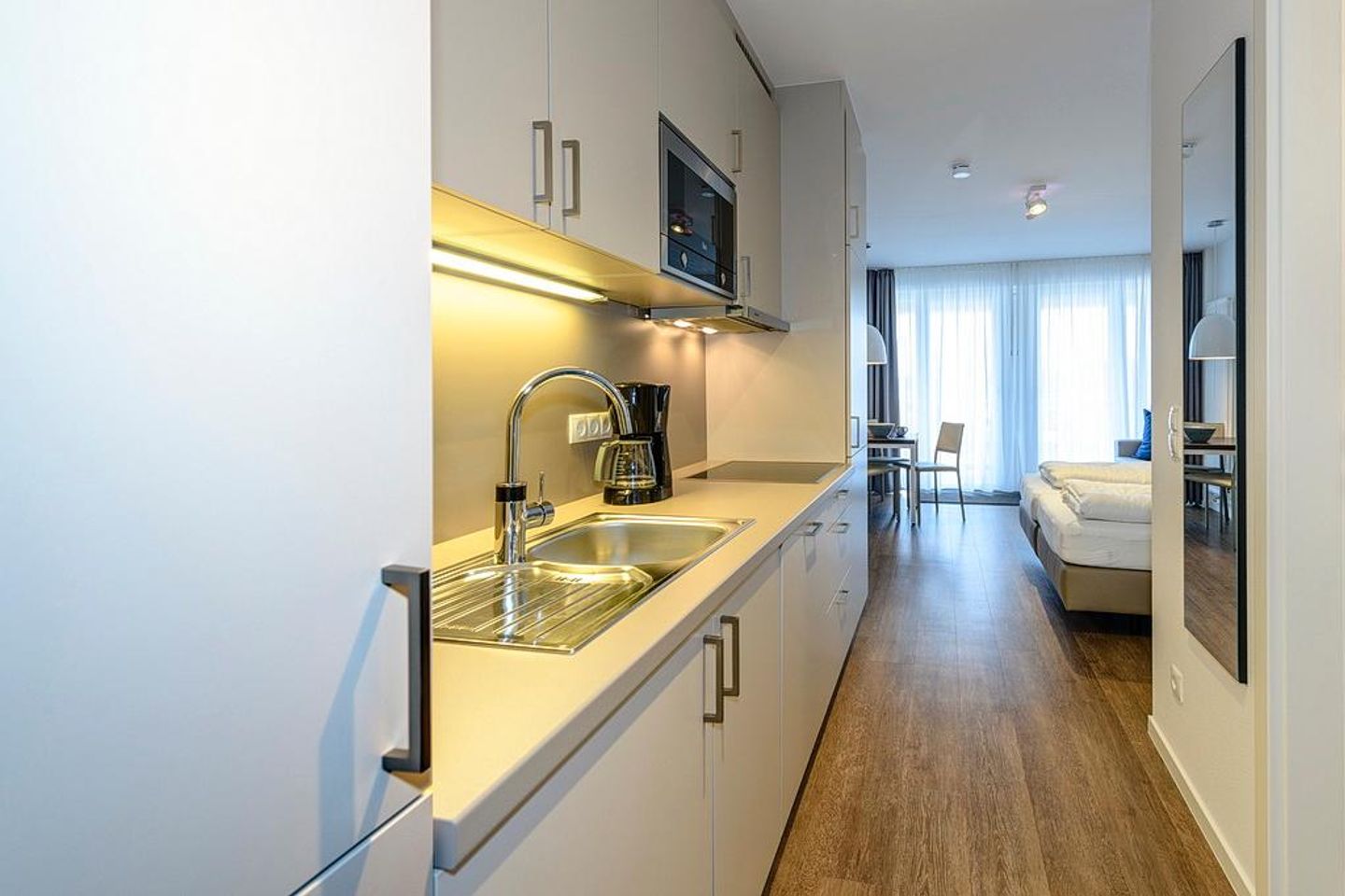 Deichhäuser Anna Küste Deichhäuser Anna Küste 3-22 Bensersiel - Wohn- Essbereich mit Küchenzeile