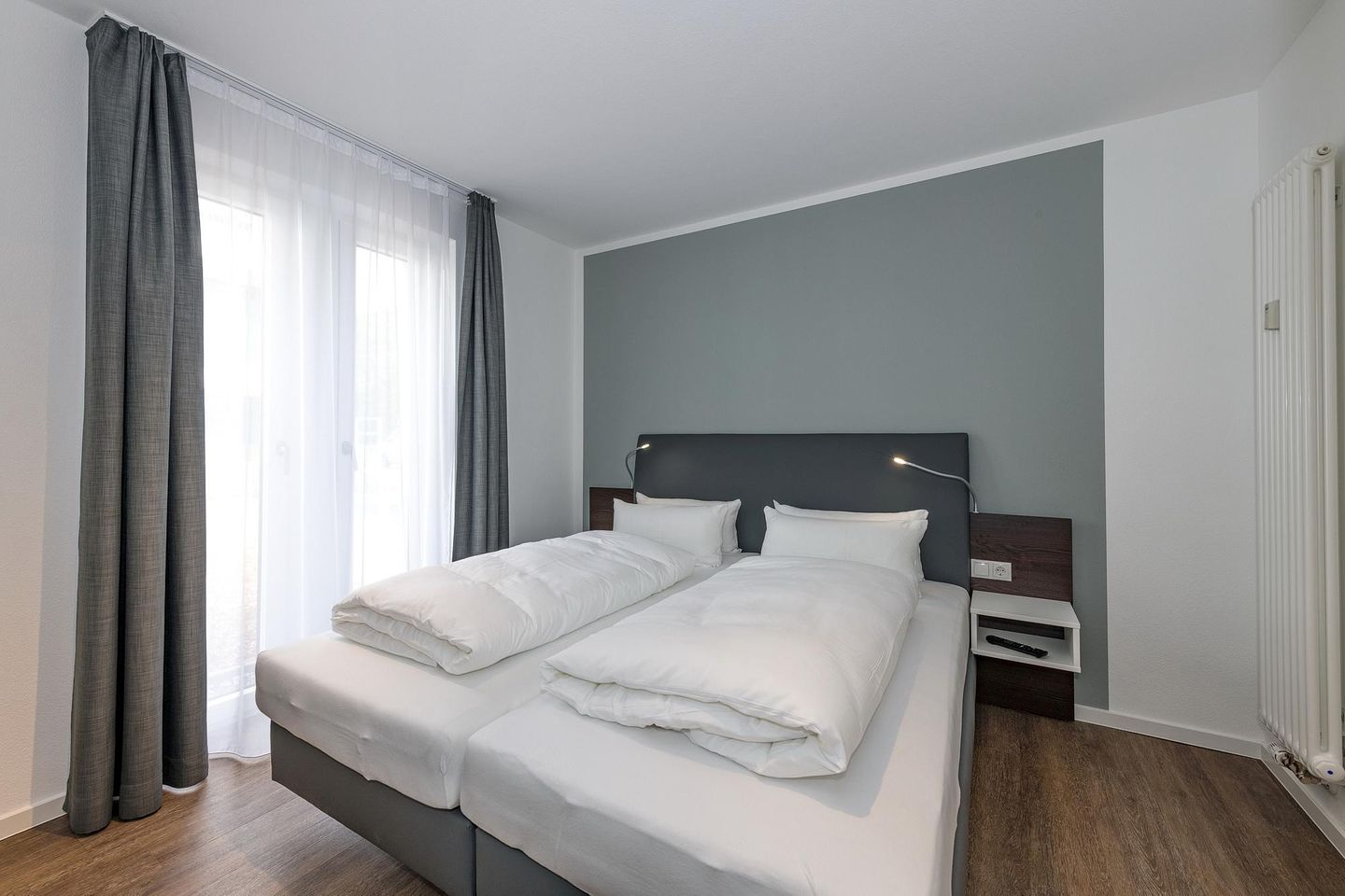 Deichhäuser Anna Küste Deichhäuser Anna Küste 6-10 Bensersiel - Schlafzimmer mit Doppelbett