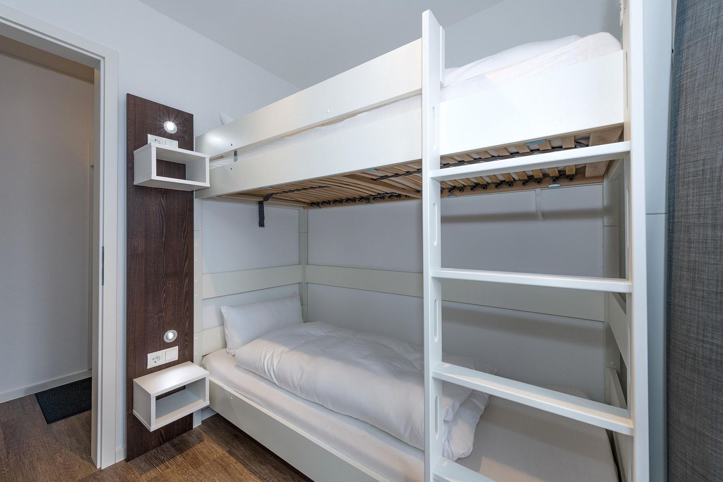 Deichhäuser Anna Küste Deichhäuser Anna Küste 6-10 Bensersiel - Schlafzimmer mit Etagenbett