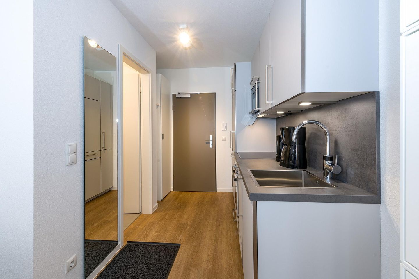 Deichhäuser Anna Küste Deichhäuser Anna Küste 6-12 Bensersiel - Eingangsbereich mit Küchenzeile