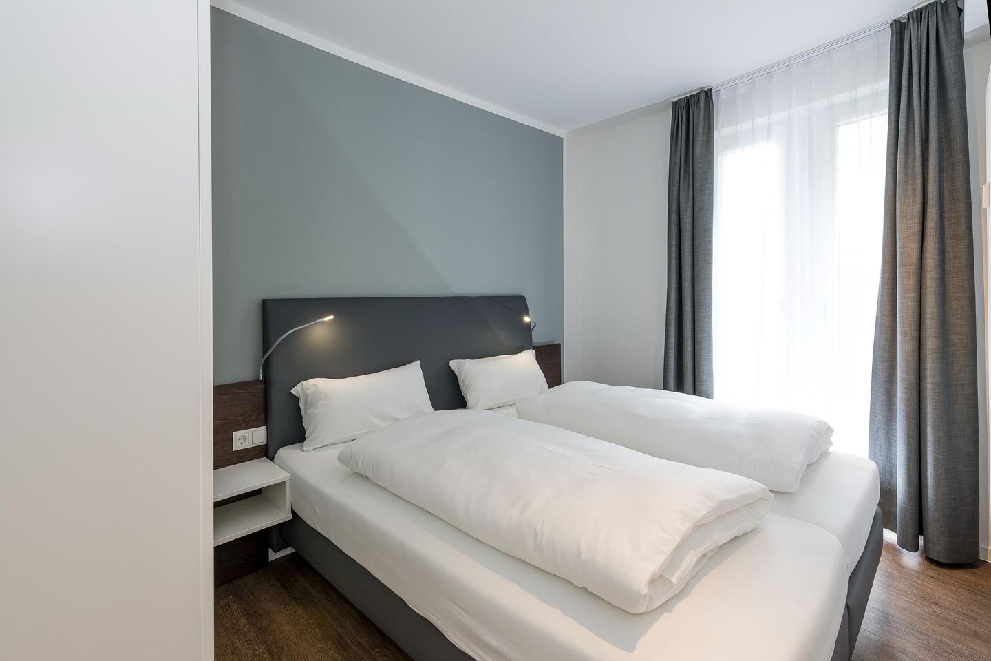 Deichhäuser Anna Küste Deichhäuser Anna Küste 6-13 Bensersiel - Schlafzimmer mit Doppelbett