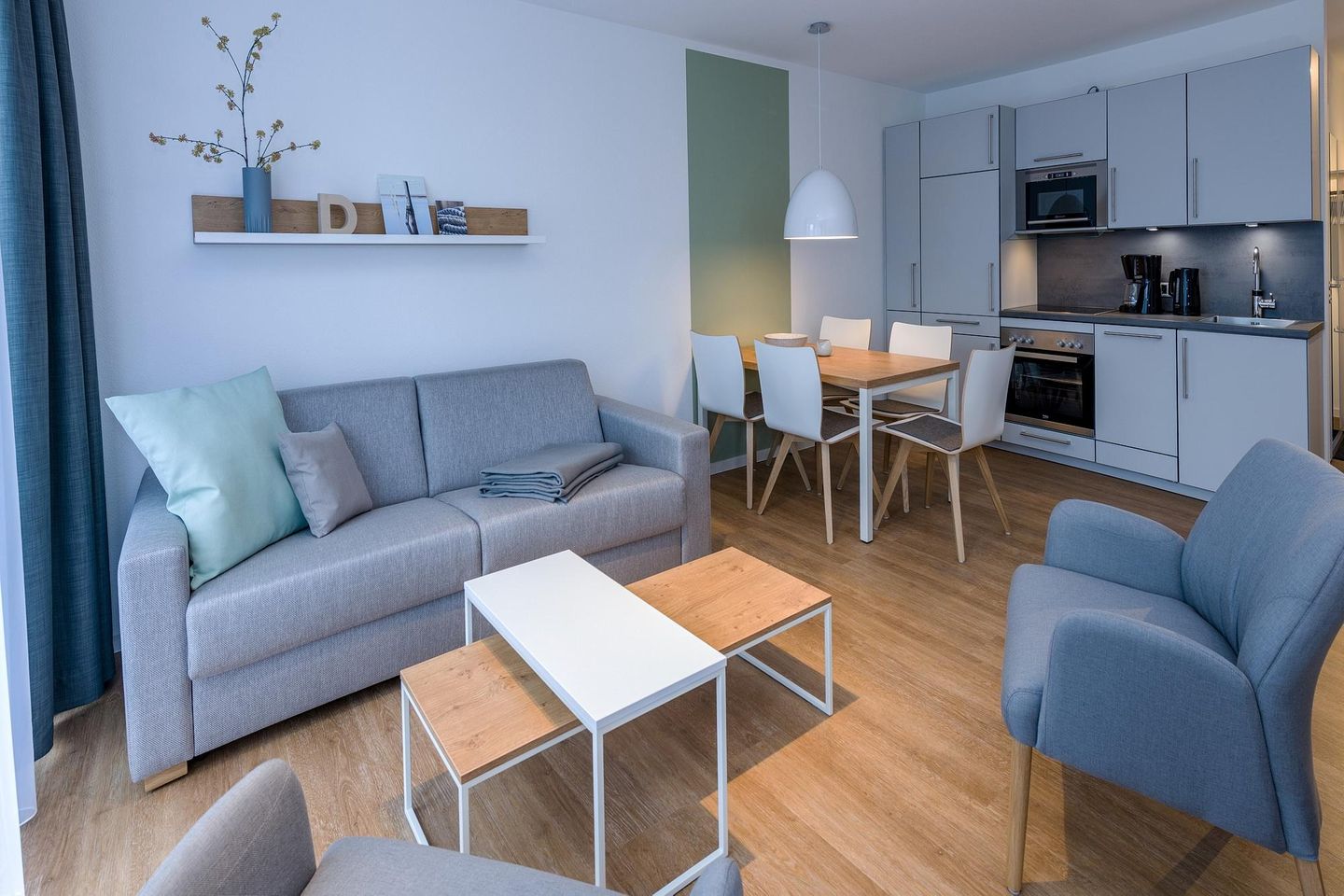 Deichhäuser Anna Küste Deichhäuser Anna Küste 6-14 Bensersiel - Wohn-Essbereich mit Küchenzeile