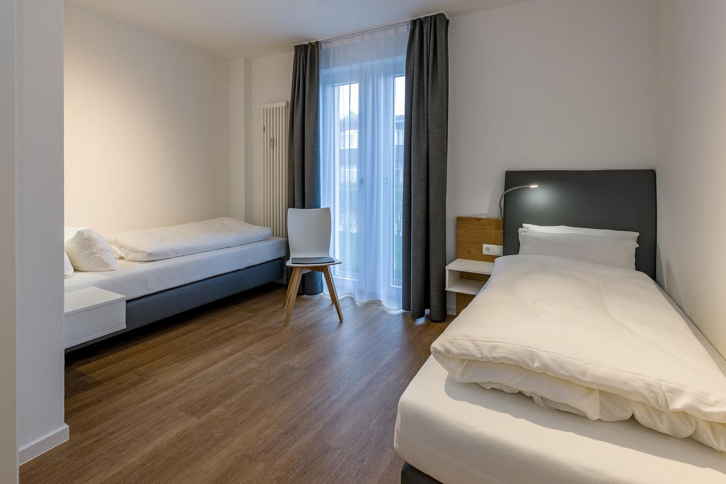 Deichhäuser Anna Küste Deichhäuser Anna Küste 6-14 Bensersiel - Schlafzimmer mit zwei Einzelbetten