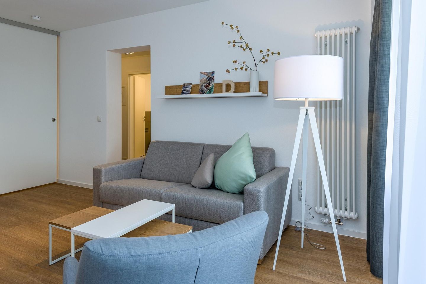 Deichhäuser Anna Küste Deichhäuser Anna Küste 6-21 Bensersiel - Wohnbereich mit Couch