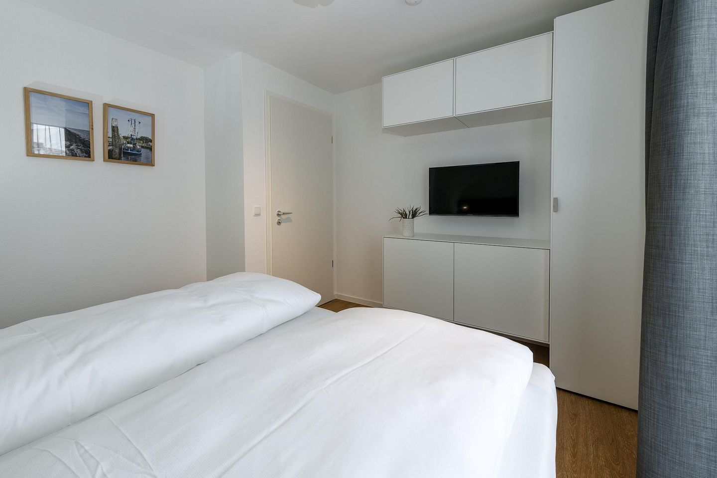 Deichhäuser Anna Küste Deichhäuser Anna Küste 6-30 Bensersiel - Schlafzimmer mit Doppelbett