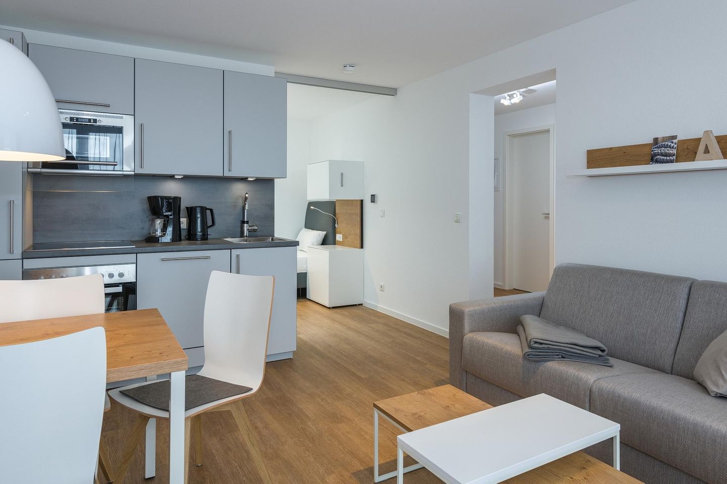 Deichhäuser Anna Küste Deichhäuser Anna Küste 6-31 Bensersiel - Wohn-Essbereich mit Küchenzeile