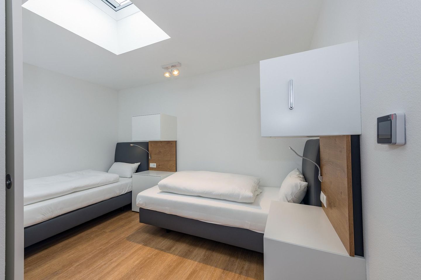 Deichhäuser Anna Küste Deichhäuser Anna Küste 6-31 Bensersiel - Schlafzimmer mit zwei Einzelbetten