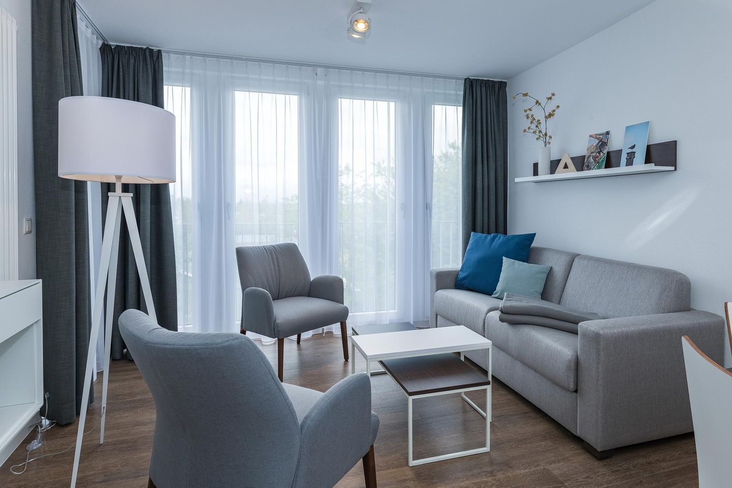 Deichhäuser Anna Küste Deichhäuser Anna Küste 6-34 Bensersiel - Wohn-Essbereich mit Couch