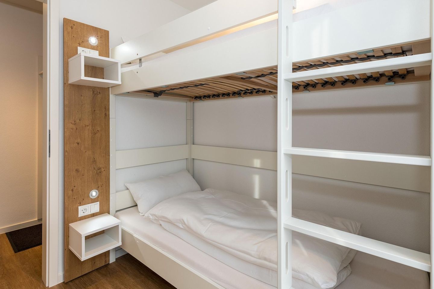 Deichhäuser Anna Küste Deichhäuser Anna Küste 7-10 Bensersiel - Schlafzimmer mit Etagenbett