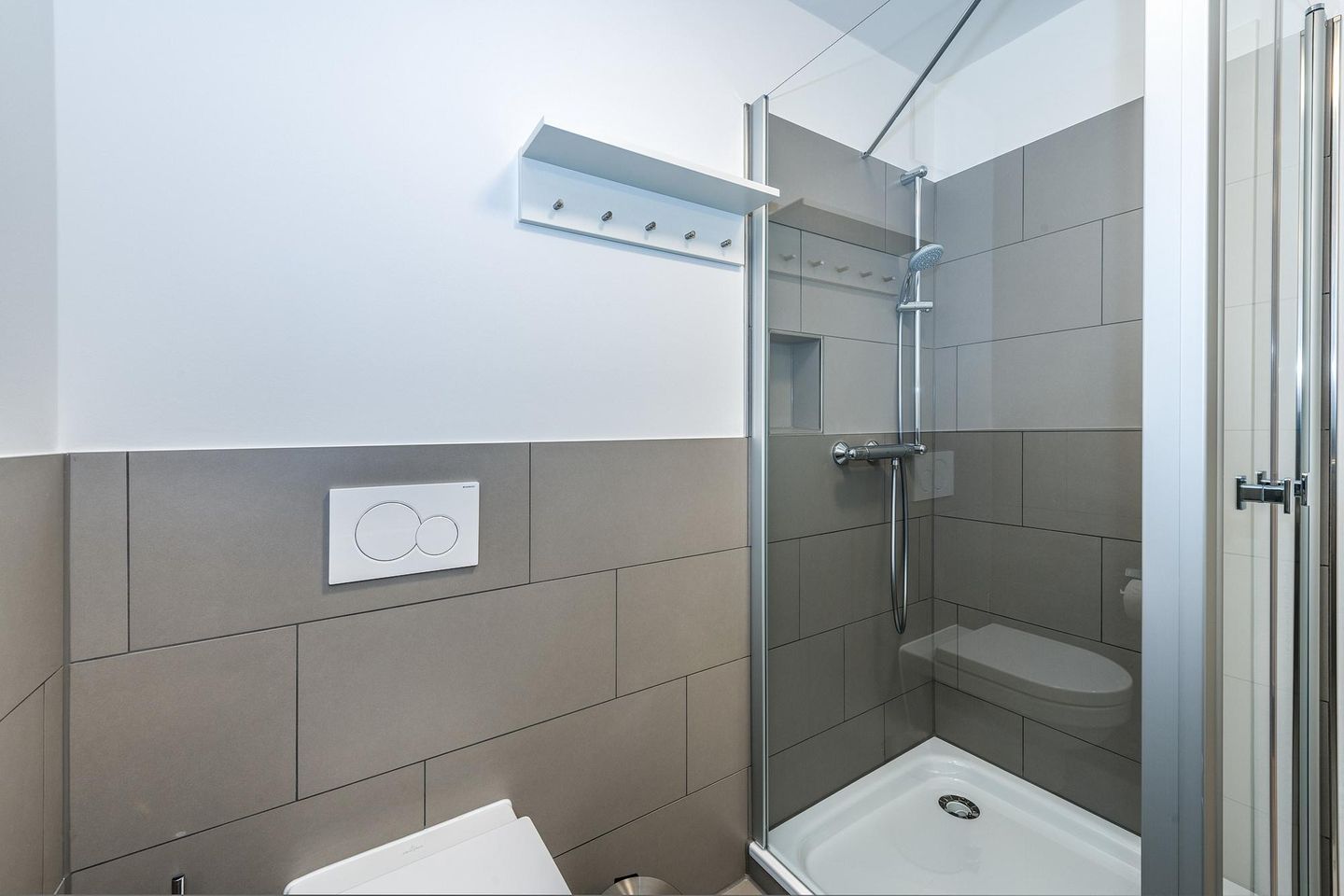 Deichhäuser Anna Küste Deichhäuser Anna Küste 7-13 Bensersiel - Badezimmer mit Dusche