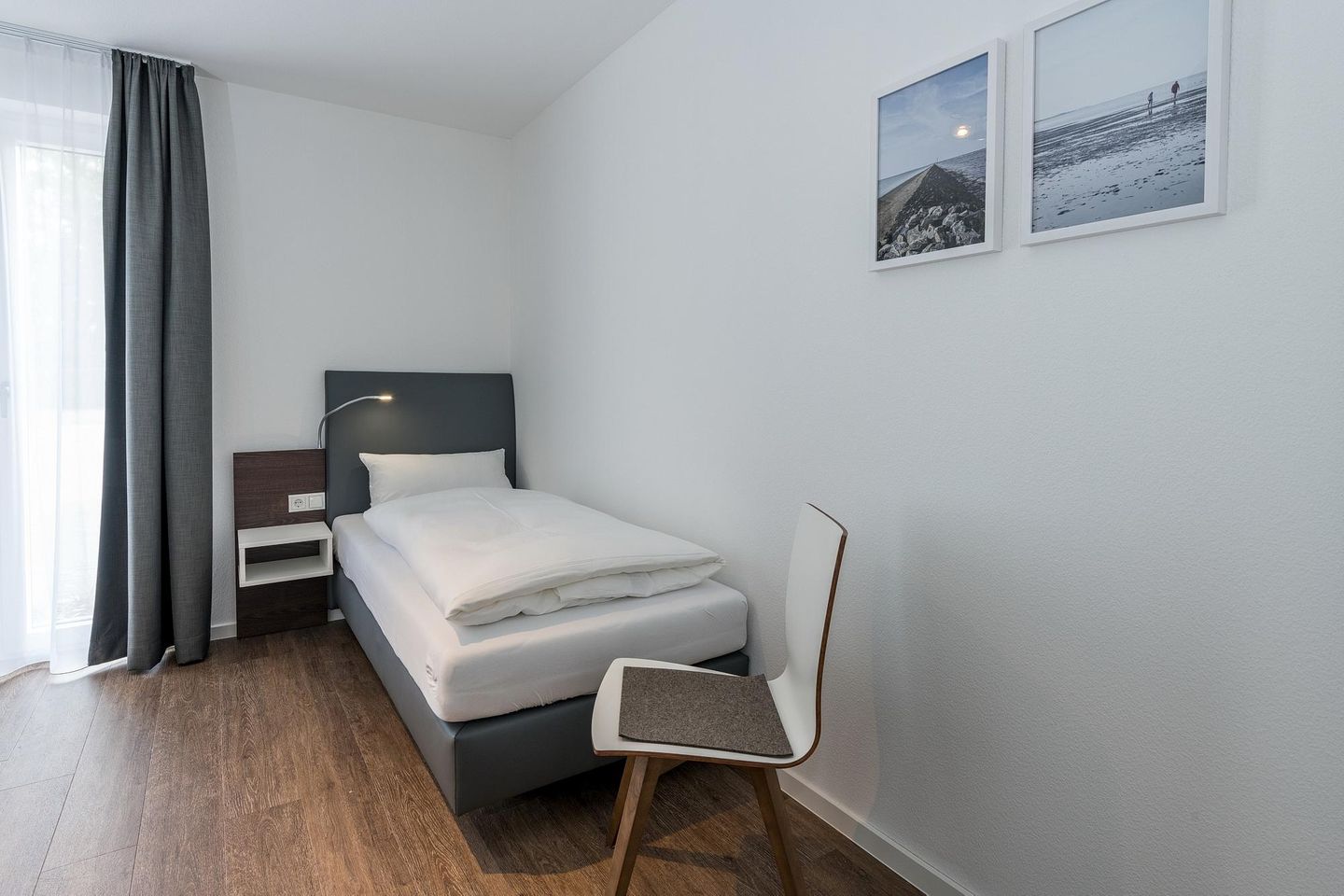 Deichhäuser Anna Küste Deichhäuser Anna Küste 7-14 Bensersiel - Schlafzimmer mit zwei Einzelbetten