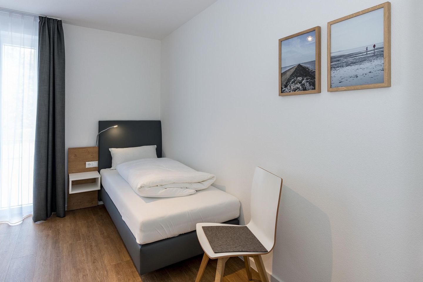 Deichhäuser Anna Küste Deichhäuser Anna Küste 7-24 Bensersiel - Schlafzimmer mit zwei Einzelbetten