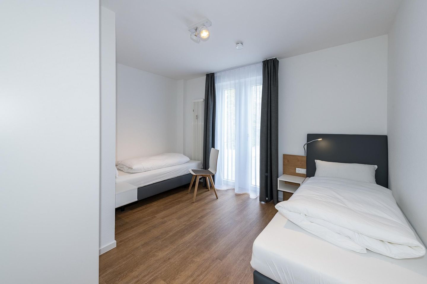 Deichhäuser Anna Küste Deichhäuser Anna Küste 7-24 Bensersiel - Schlafzimmer mit zwei Einzelbetten