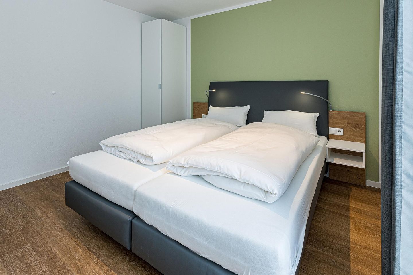 Deichhäuser Anna Küste Deichhäuser Anna Küste 7-30 Bensersiel - Schlafzimmer mit Doppelbett