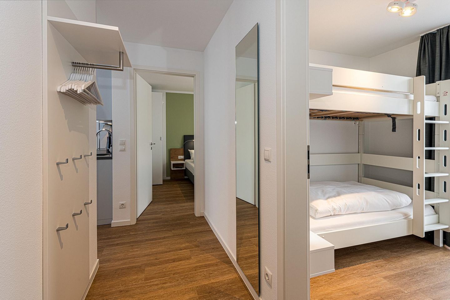 Deichhäuser Anna Küste Deichhäuser Anna Küste 7-30 Bensersiel - Schlafzimmer mit Etagenbett