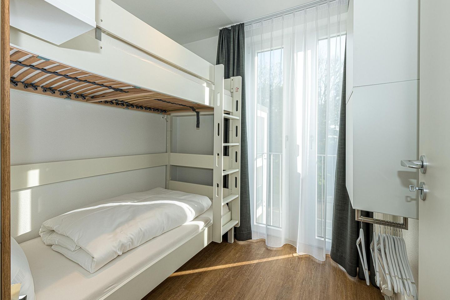 Deichhäuser Anna Küste Deichhäuser Anna Küste 7-30 Bensersiel - Schlafzimmer mit Etagenbett