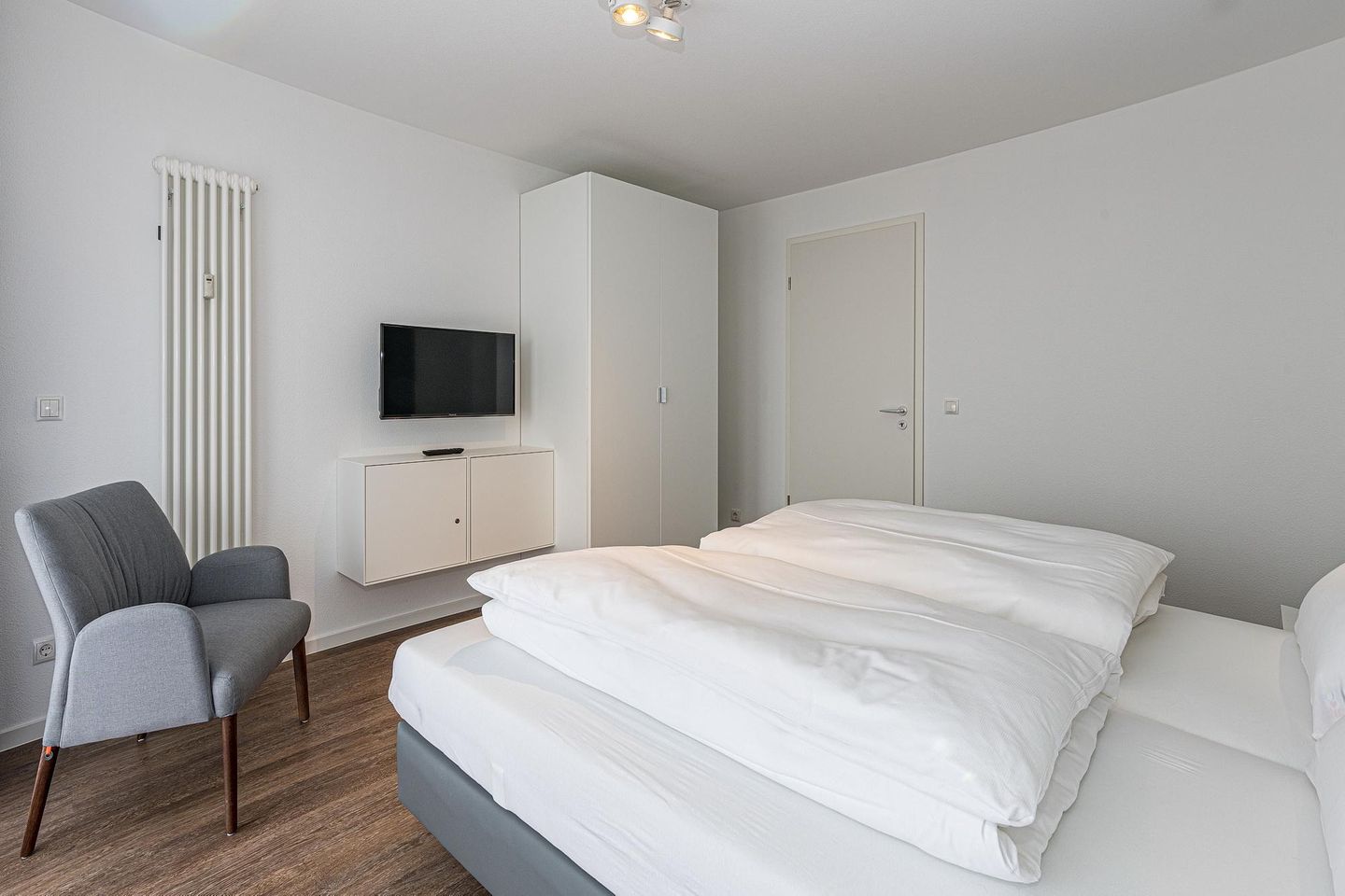 Deichhäuser Anna Küste Deichhäuser Anna Küste 7-31 Bensersiel - Wohn-Essbereich mit Couch