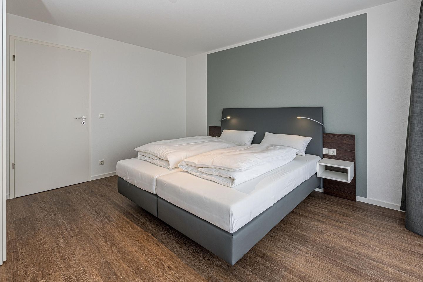 Deichhäuser Anna Küste Deichhäuser Anna Küste 7-31 Bensersiel - Wohn-Essbereich mit Couch