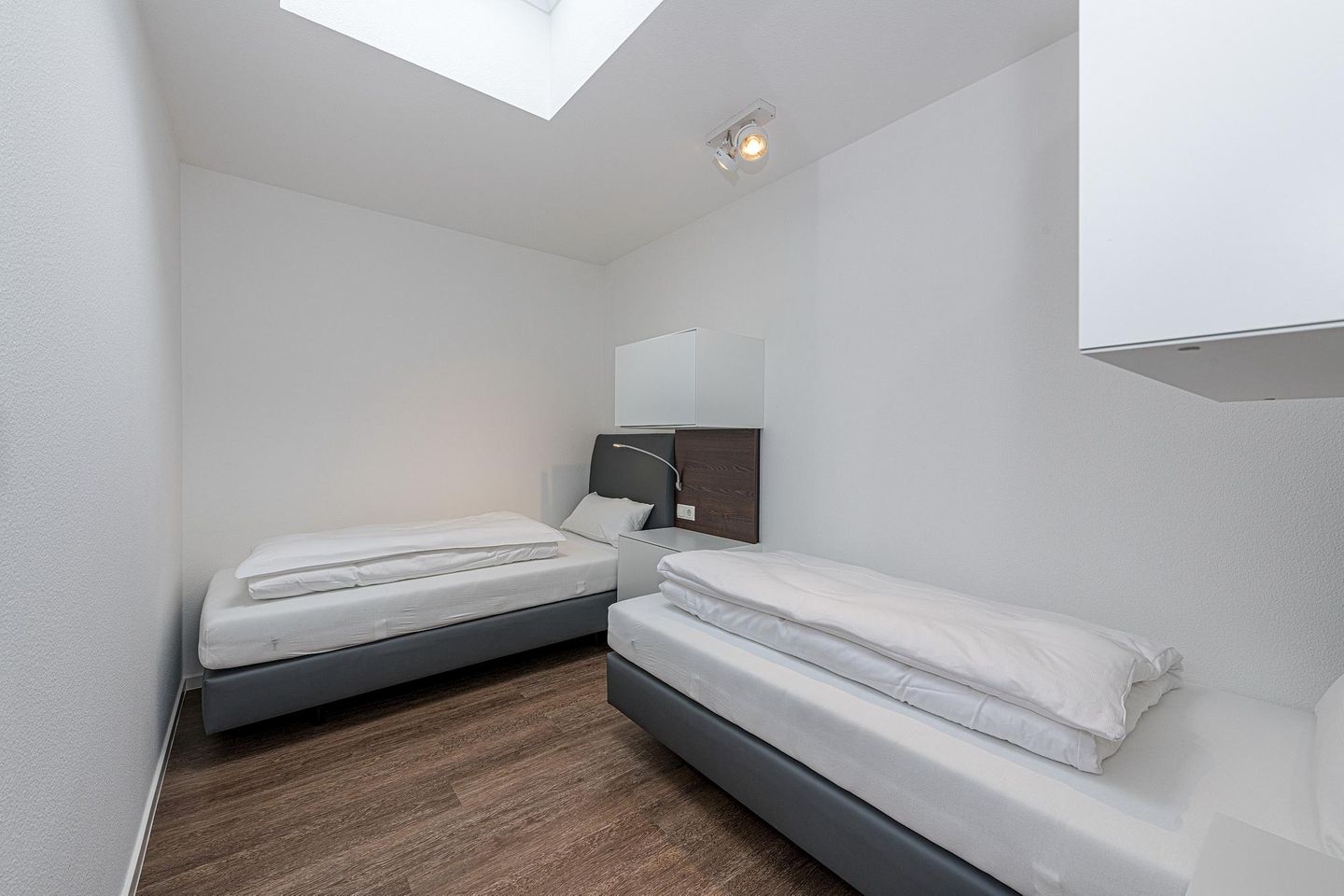 Deichhäuser Anna Küste Deichhäuser Anna Küste 7-31 Bensersiel - Schlafzimmer mit zwei Einzelbetten