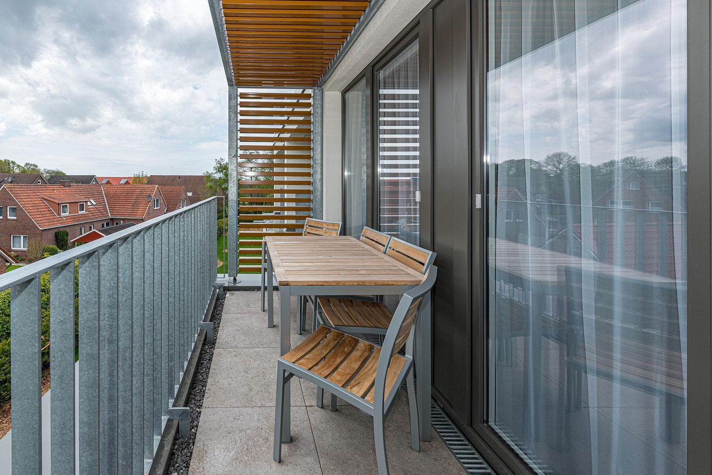 Deichhäuser Anna Küste Deichhäuser Anna Küste 7-33 Bensersiel - Balkon mit Gartenmöbeln