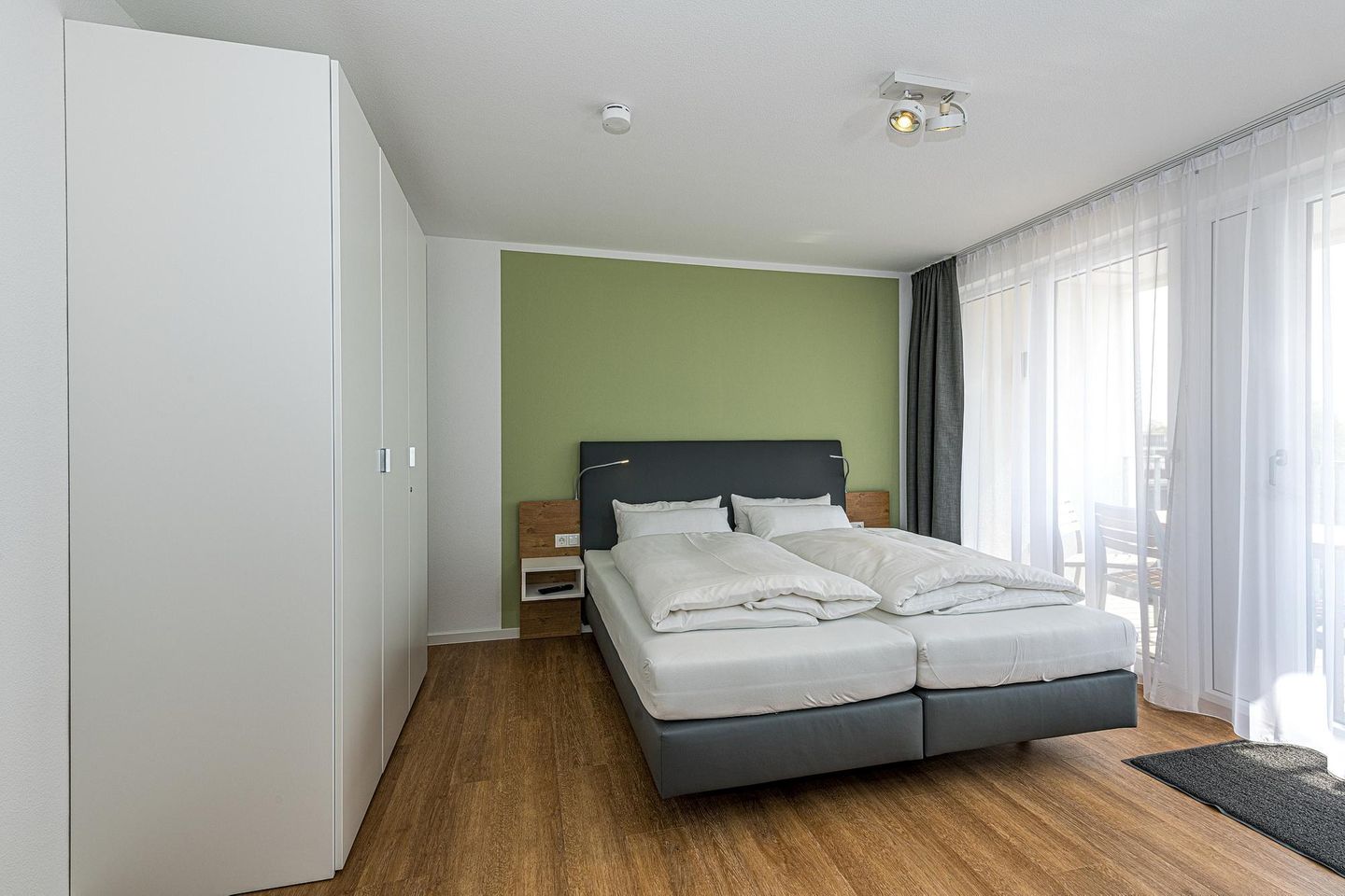 Deichhäuser Anna Küste Deichhäuser Anna Küste 7-34 Bensersiel - Schlafzimmer mit Doppelbett