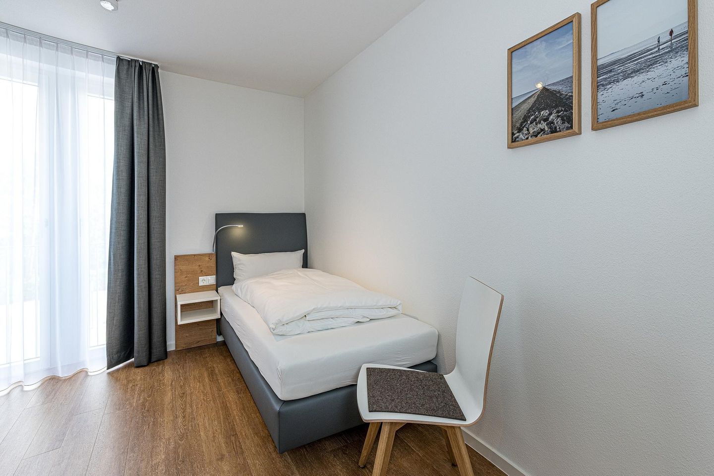 Deichhäuser Anna Küste Deichhäuser Anna Küste 7-34 Bensersiel - Schlafzimmer mit zwei Einzelbetten