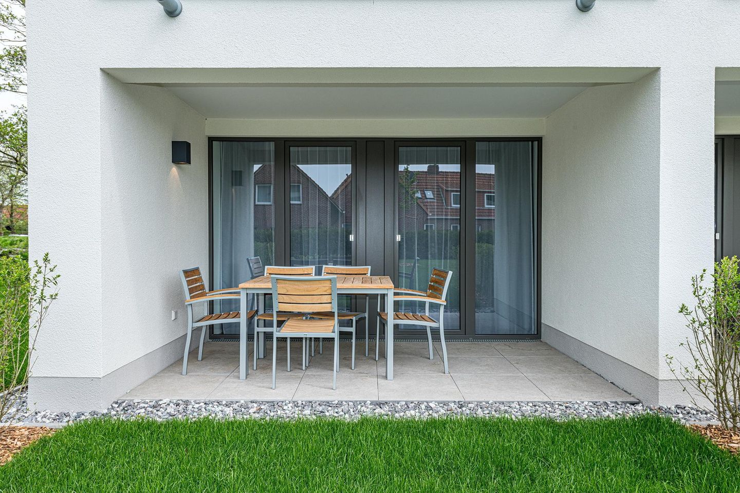 Deichhäuser Anna Küste Deichhäuser Anna Küste 8-10 Bensersiel - Terrasse mit Gartenmöbeln