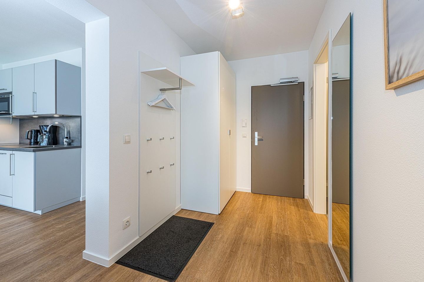 Deichhäuser Anna Küste Deichhäuser Anna Küste 8-11 Bensersiel - Flur mit Garderobe