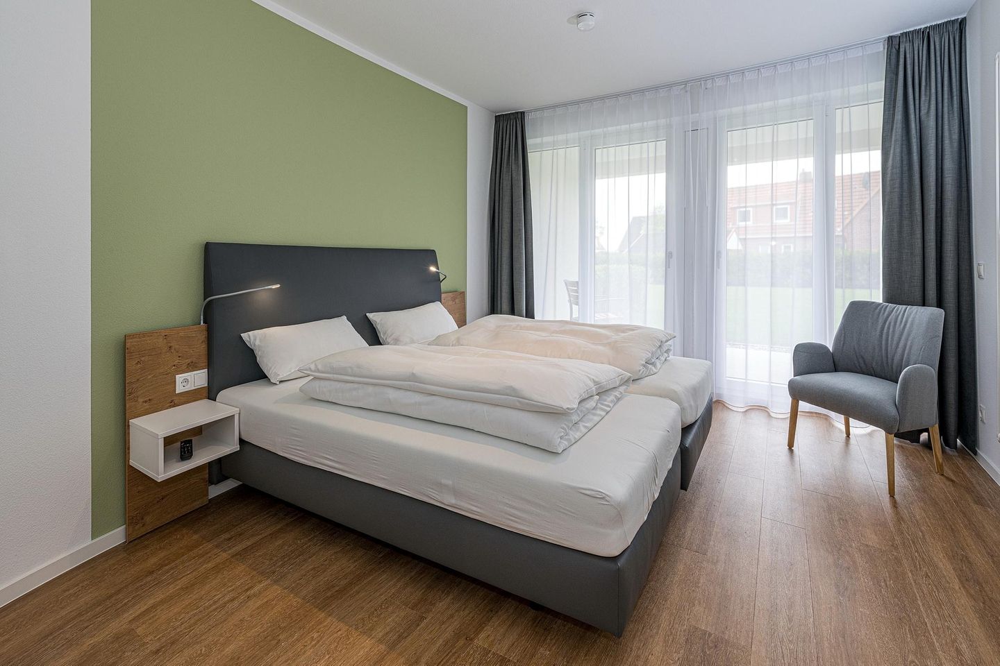 Deichhäuser Anna Küste Deichhäuser Anna Küste 8-11 Bensersiel - Schlafzimmer mit Doppelbett