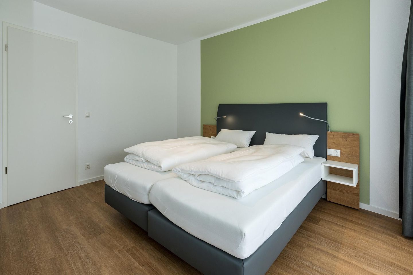 Deichhäuser Anna Küste Deichhäuser Anna Küste 8-11 Bensersiel - Schlafzimmer mit Doppelbett