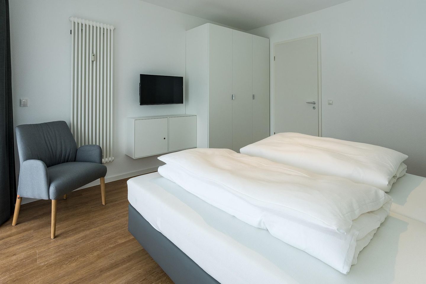 Deichhäuser Anna Küste Deichhäuser Anna Küste 8-11 Bensersiel - Schlafzimmer mit Doppelbett