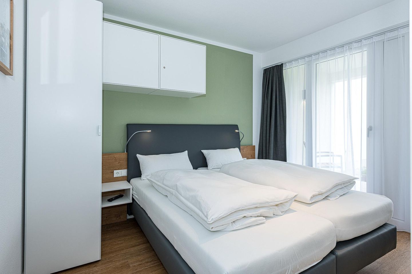 Deichhäuser Anna Küste Deichhäuser Anna Küste 8-13 Bensersiel - Schlafzimmer mit Doppelbett