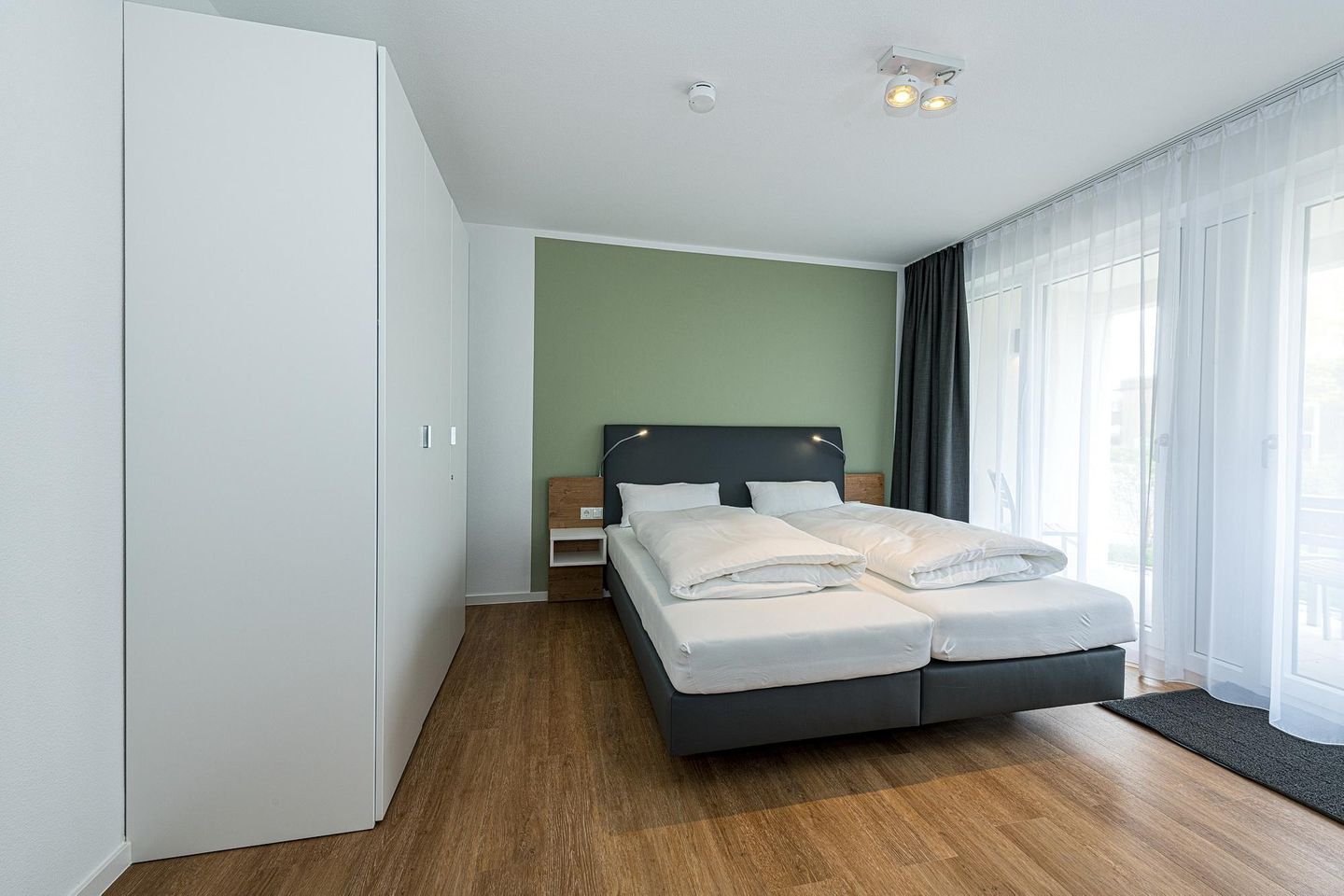 Deichhäuser Anna Küste Deichhäuser Anna Küste 8-14 Bensersiel - Schlafzimmer mit Doppelbett