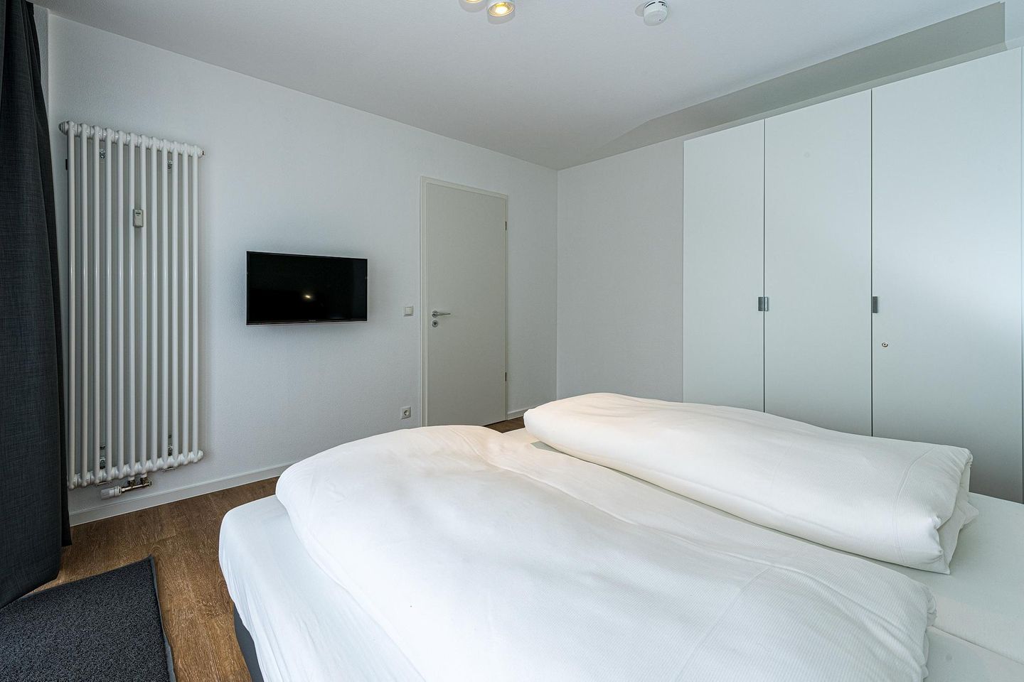 Deichhäuser Anna Küste Deichhäuser Anna Küste 8-14 Bensersiel - Schlafzimmer mit Doppelbett