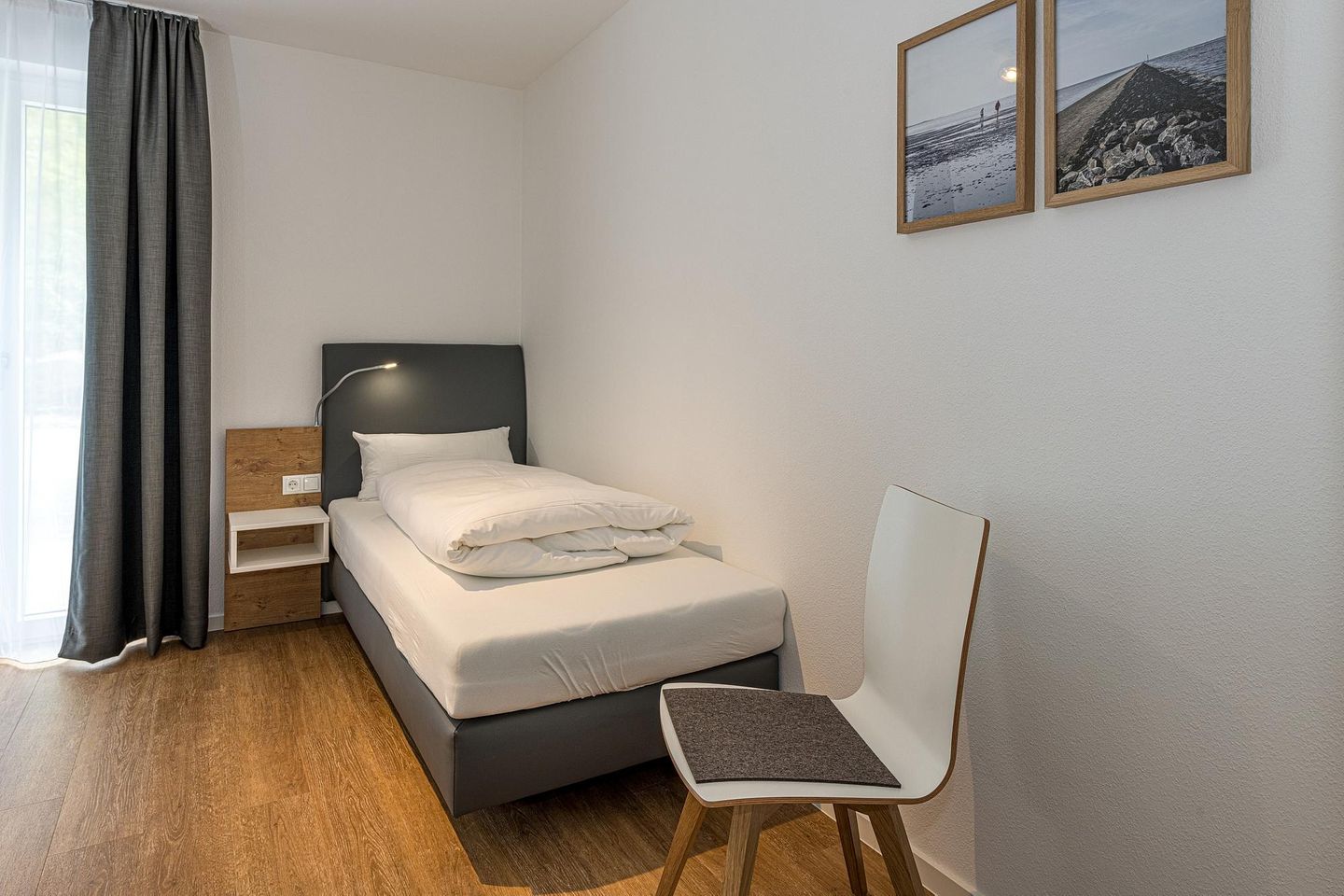 Deichhäuser Anna Küste Deichhäuser Anna Küste 8-14 Bensersiel - Schlafzimmer mit zwei Einzelbetten