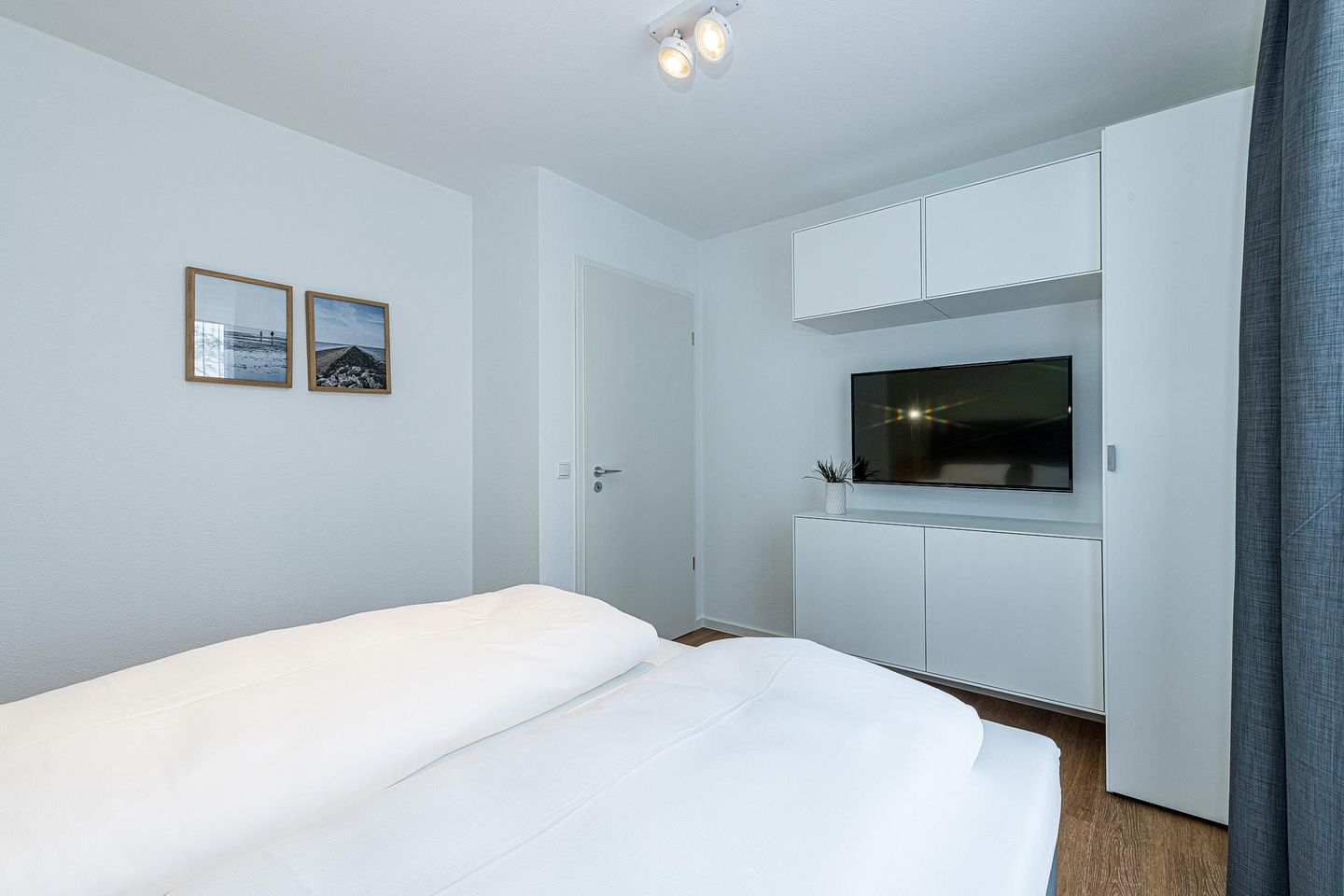 Deichhäuser Anna Küste Deichhäuser Anna Küste 8-20 Bensersiel - Schlafzimmer mit Doppelbett