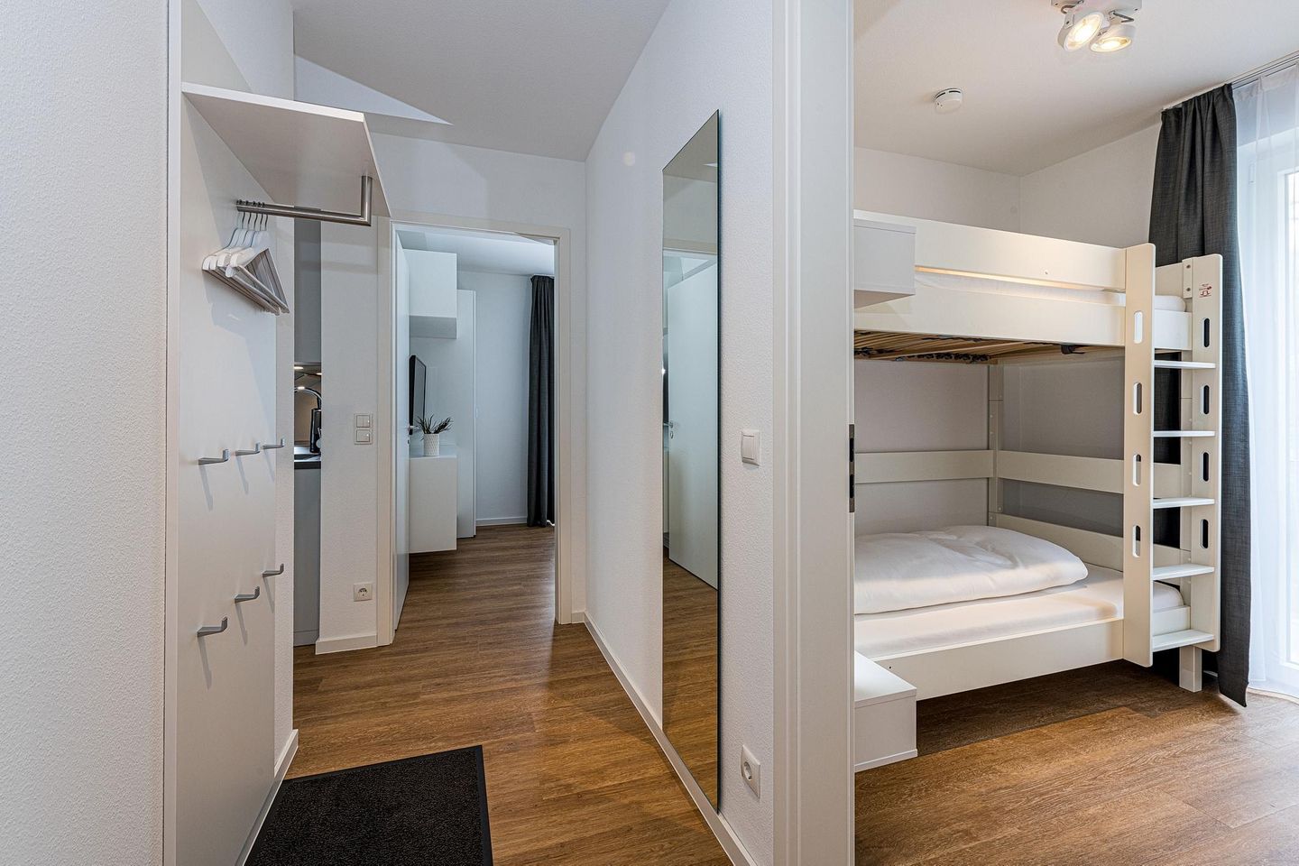 Deichhäuser Anna Küste Deichhäuser Anna Küste 8-20 Bensersiel - Schlafzimmer mit Etagenbett