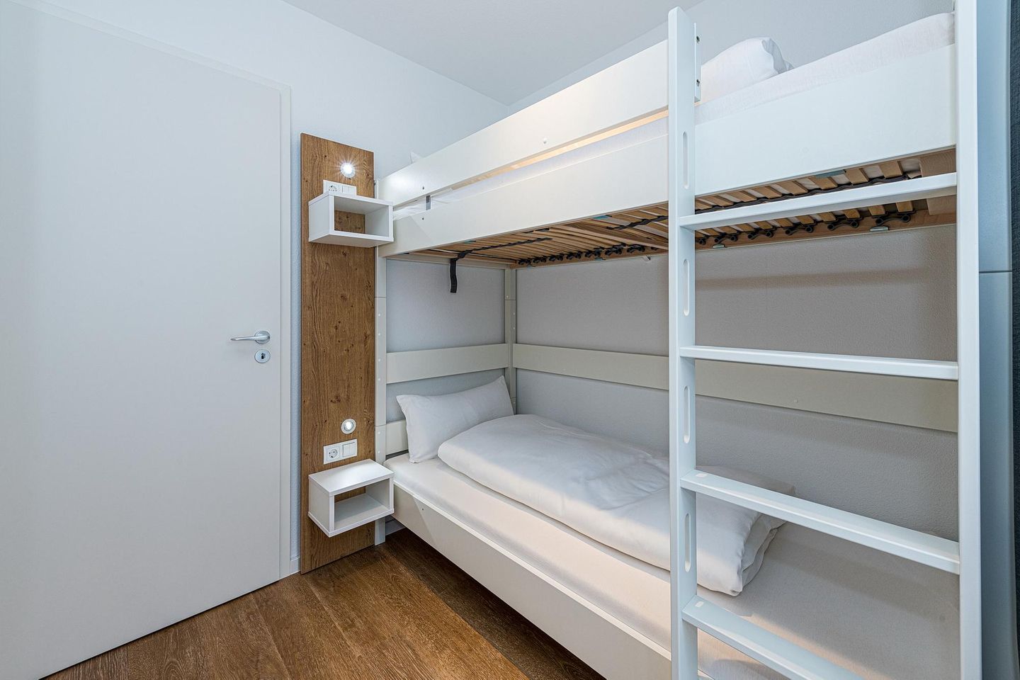 Deichhäuser Anna Küste Deichhäuser Anna Küste 8-20 Bensersiel - Schlafzimmer mit Etagenbett