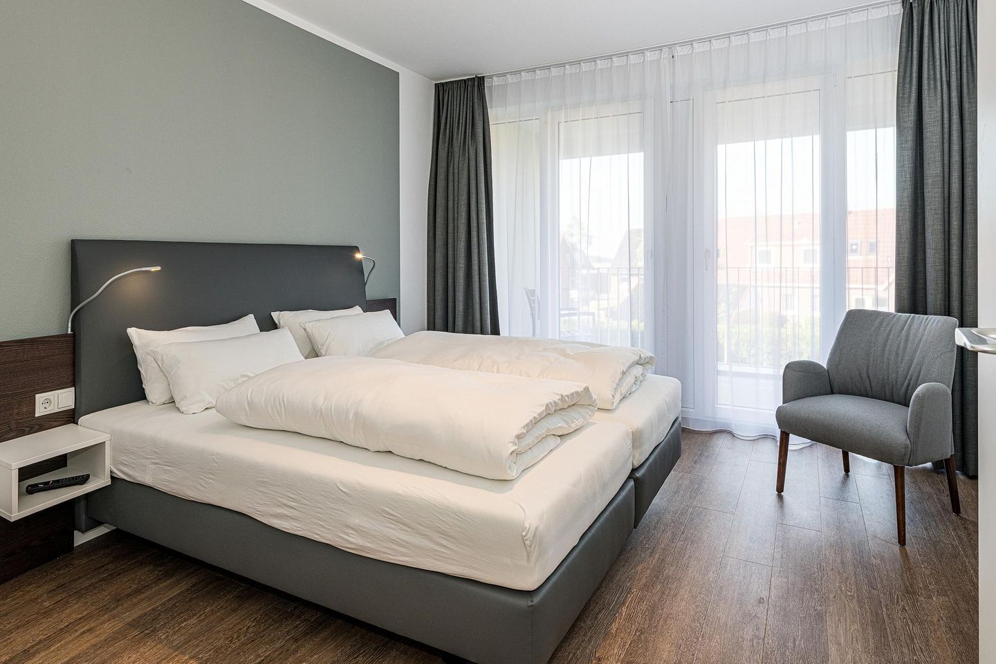 Deichhäuser Anna Küste Deichhäuser Anna Küste 8-21 Bensersiel - Schlafzimmer mit Doppelbett