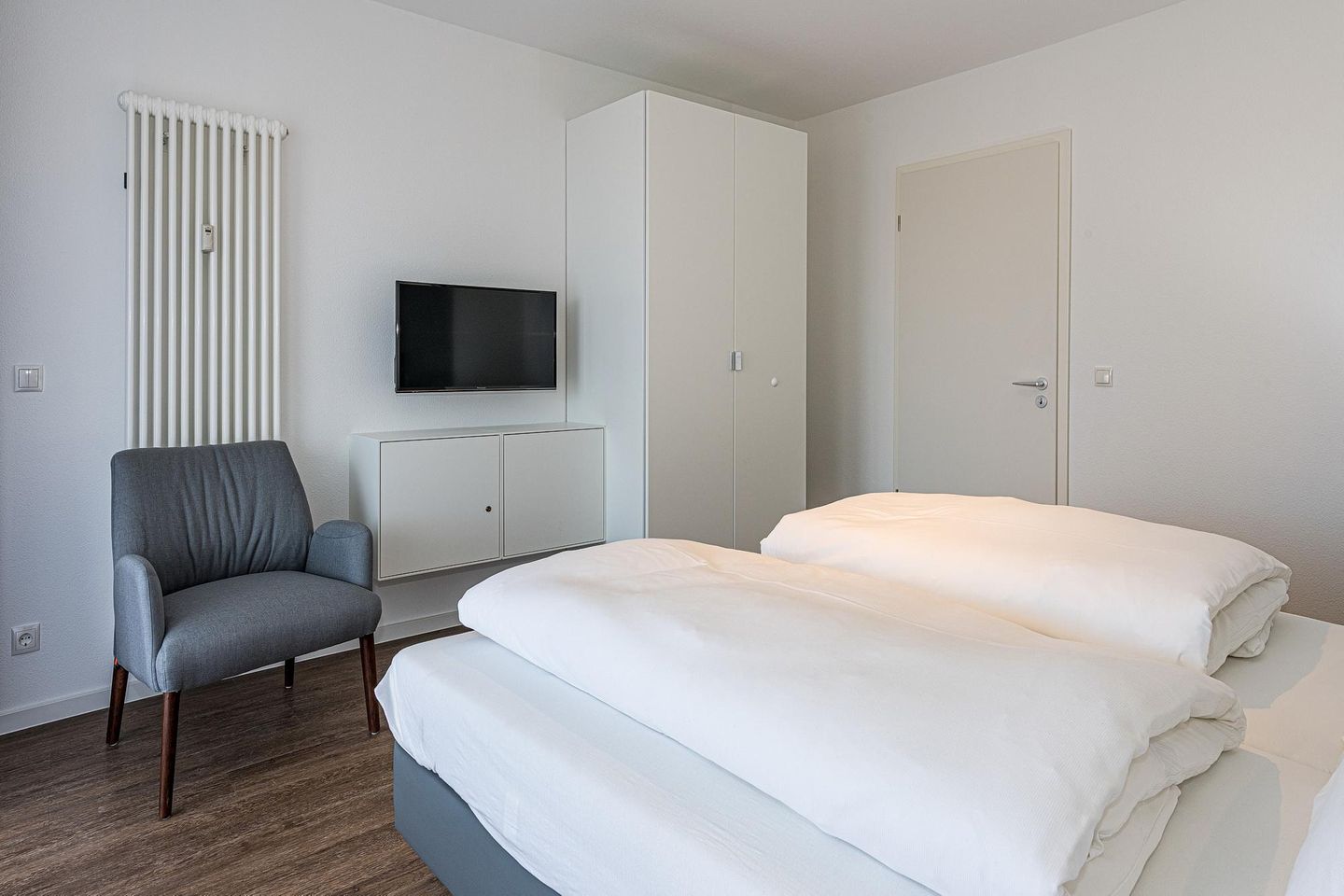 Deichhäuser Anna Küste Deichhäuser Anna Küste 8-21 Bensersiel - Schlafzimmer mit Doppelbett