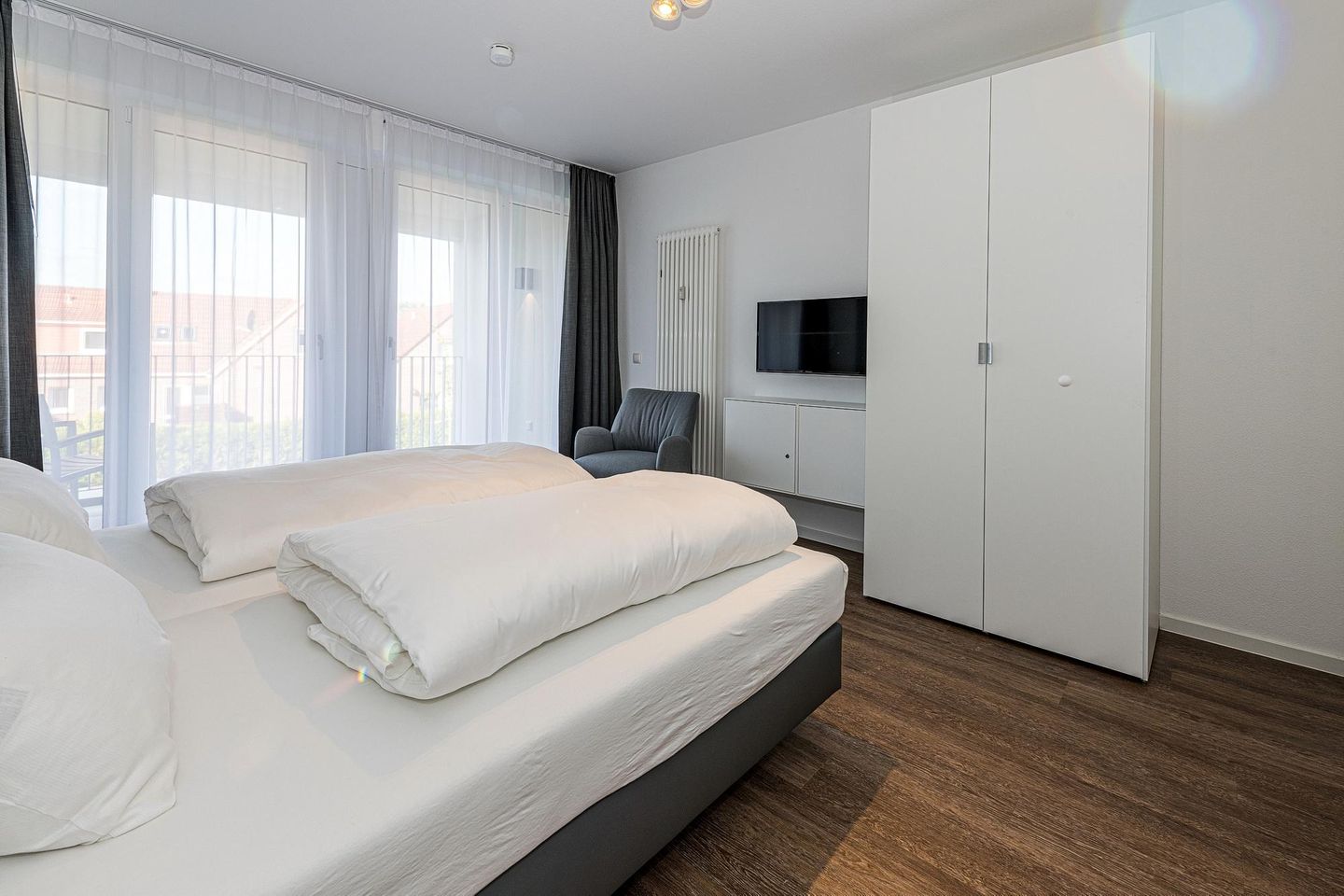 Deichhäuser Anna Küste Deichhäuser Anna Küste 8-21 Bensersiel - Schlafzimmer mit Doppelbett